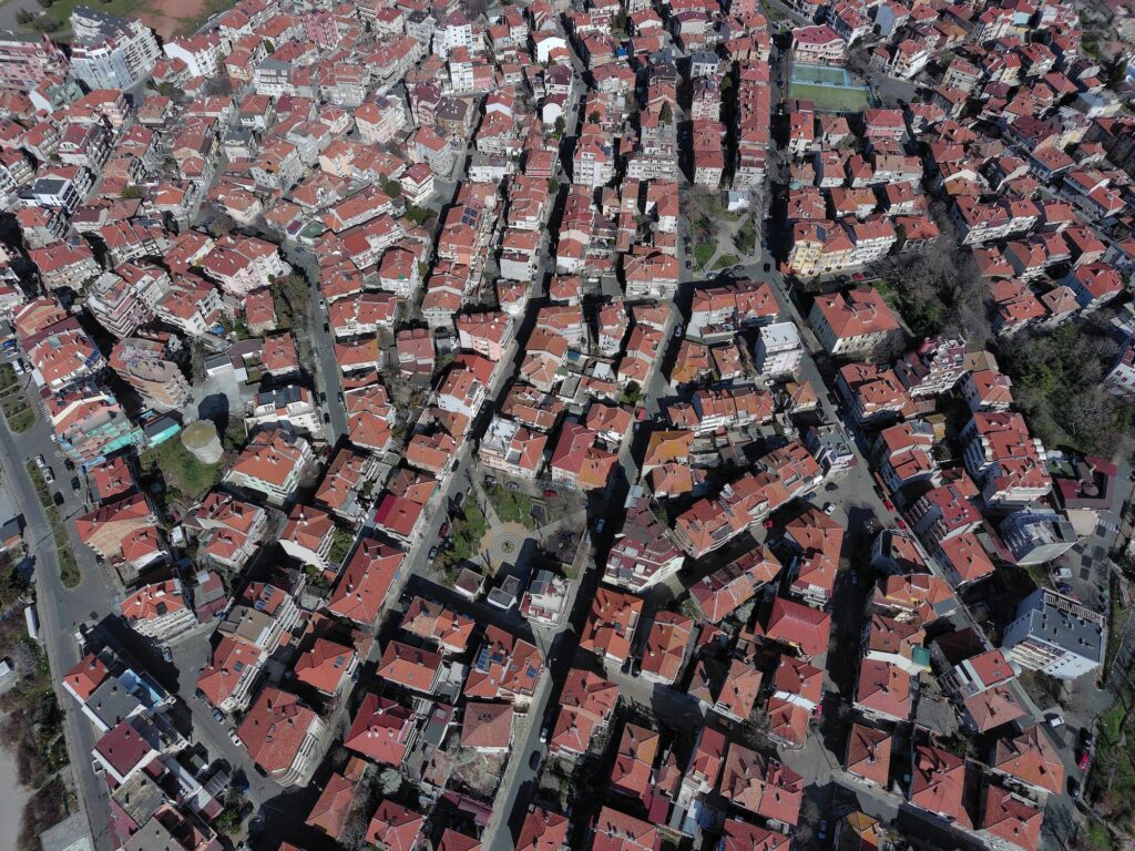 View from a height of the city of Pomorie with many cars, houses and hotels